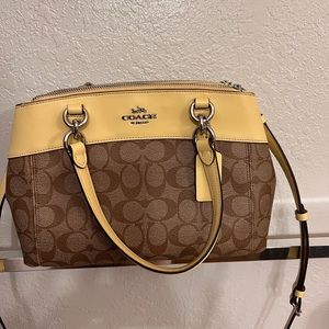 Coach purse. Yellow and brown. Like new condition